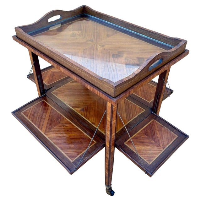 Elegant French Art Deco bar cart or occasional table dating from the 1930s, crafted with beautifully figured walnut veneer...