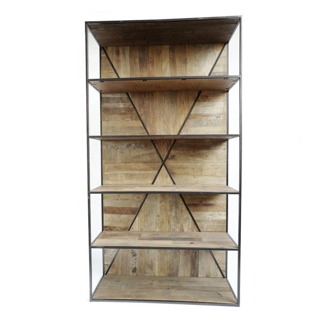 Handsome salvaged barn wood shelf with modern iron X frame and five spacious shelves for display and storage. Great modern...