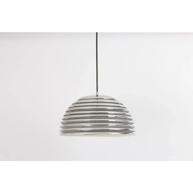 Very nice pendant light with chrome rings, designed by kazuo motozawa for staff leuchten manufactured in germany, circa...
