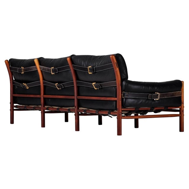 3-Seater sofa model Kontiki designed by Arne Norell in original black leather. Produced by Arne Norell AB in Aneby,...