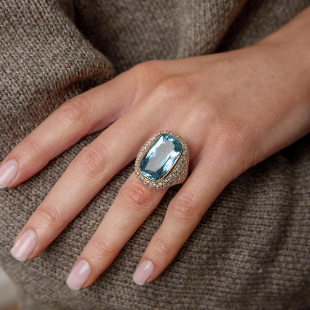 An extraordinary statement of French craftsmanship, this breathtaking cocktail ring centers on a magnificent 14.50 carat...