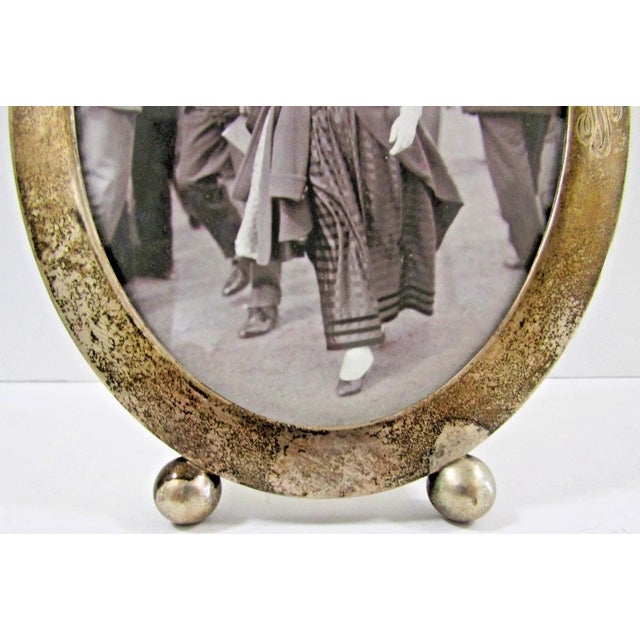 This antique hallmarked sterling silver oval picture frame with an Alice Roosevelt photo is a rare find from the Art...