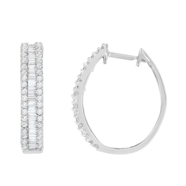 Elegant and timeless, these gorgeous 10 karat white gold diamond huggy hoop earrings feature 0.75 carat total weight of...