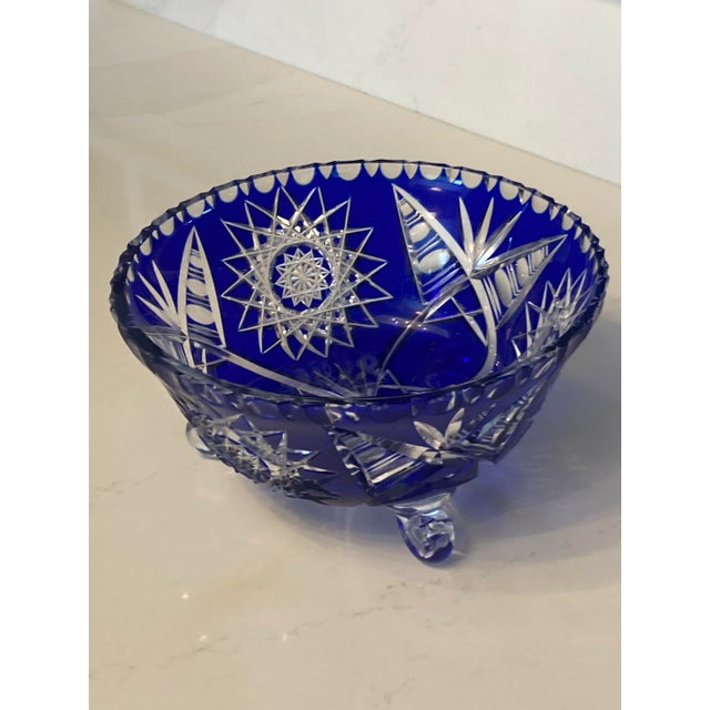 This is a beautiful, unique cobalt blue leaded crystal bowl with scalloped edges. This exquisite piece measures...
