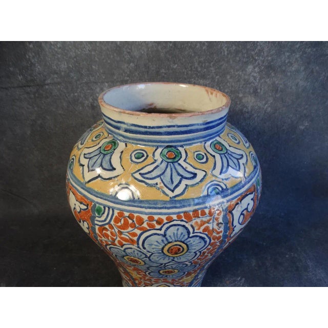 Graceful form and beautifully hand decorated. Measures 12 1/2" x 9" x 9". Typical condition for Talavera of this period.