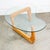 Isamu Noguchi style vintage coffee or cocktail table, rendered in a two part biomorphic solid wood frame supporting a...