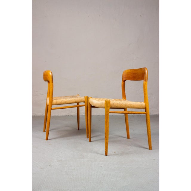 The No. 75 chairs by Niels O. Møller are among the classics of Danish design. The softly curved oak frames, the delicately...