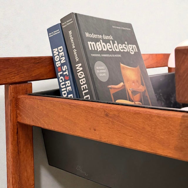 Pair of danish planters produced in denmark during the 1960s and executed in teak with integrated metal planter boxes. the...