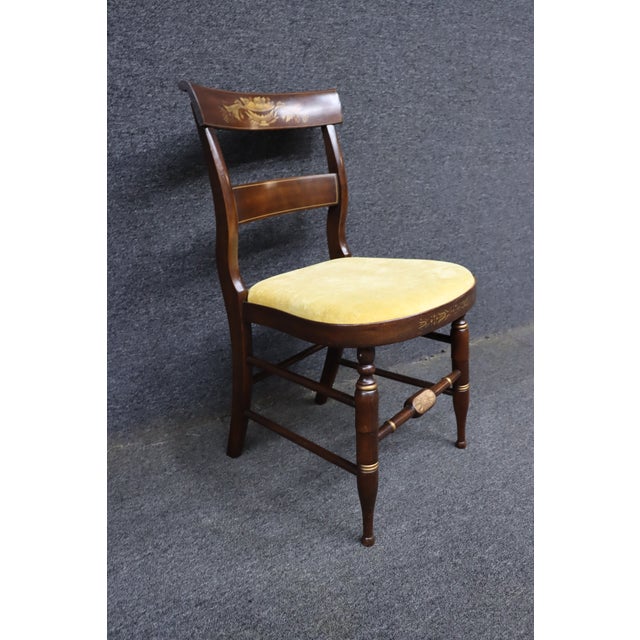Classic L. Hitchcock desk chair crafted in cherry with the company's signature hand-stenciled decoration. The curved crest...
