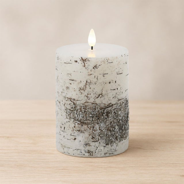 Introduce a rustic, nature-inspired vibe into your home with the FIA Wick Birch Design Pillar Candle. Featuring earthy...