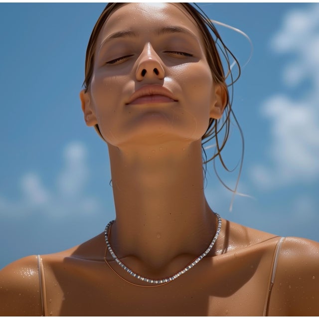 Elevate your essence with this exquisite tanzanite and 14K gold necklace from Bombyx House, a symbol of rarity and refined...