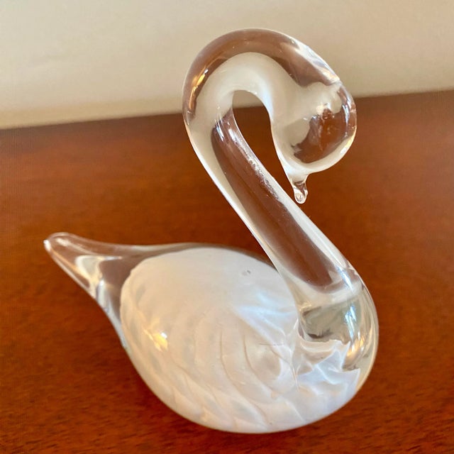 Graceful and regal swan produced mid 20th century in Sweden. Signed at the bottom of the bird