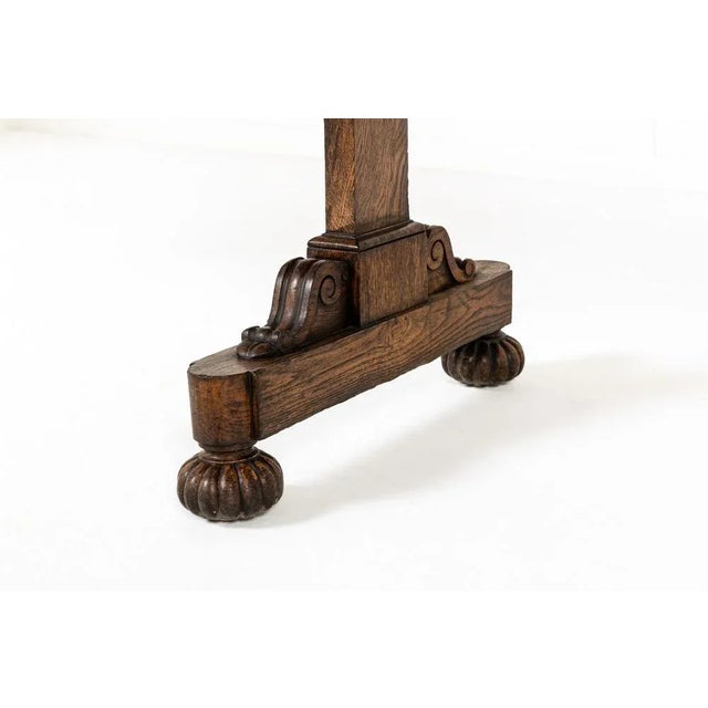 An Early 19th Century English Oak Dumb Waiter or WhatNot. Derived from the French étagère this is essentially a pair of...