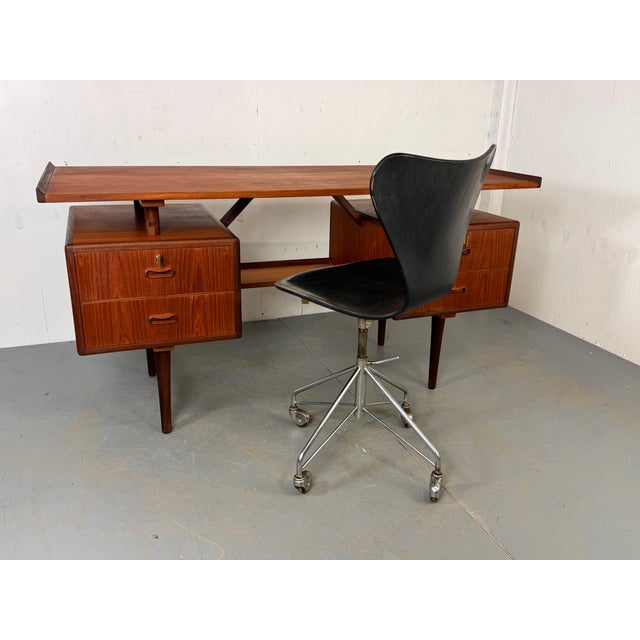 Vintage well made Danish Design Mid Century teak desk, 1950s Designed in the manner of Louis van Teeffelen for...