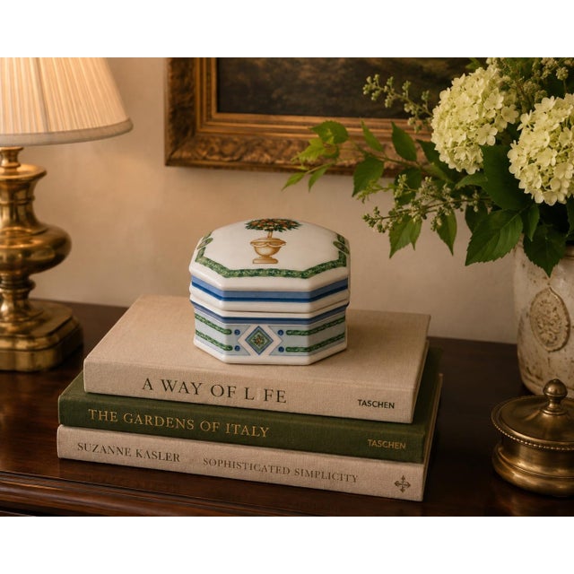 This fine porcelain octagonal trinket box features the iconic "Jardin Royal" topiary design by legacy manufacturer...