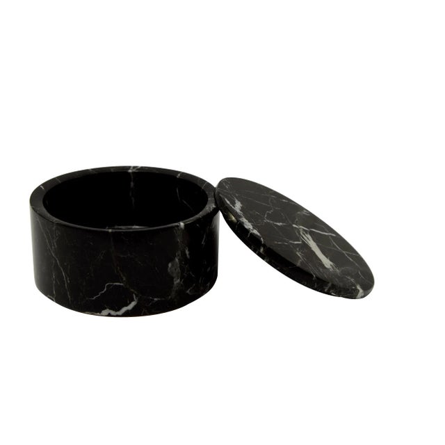 An Eirenne Collection Black Zebra Marble 4" Circular Keepsake Box.