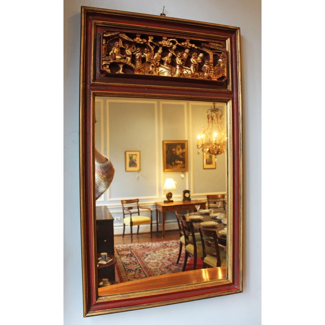 Mirror created from an antique Chinese wood panel. The delighful, likely 19th century, Chinese carved panel was custom...