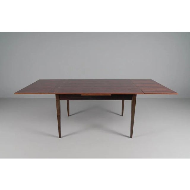 Very beautiful grain. The table has two pull-out extension leaves on the sides. Extendable from 130 cm to 220 cm. This...