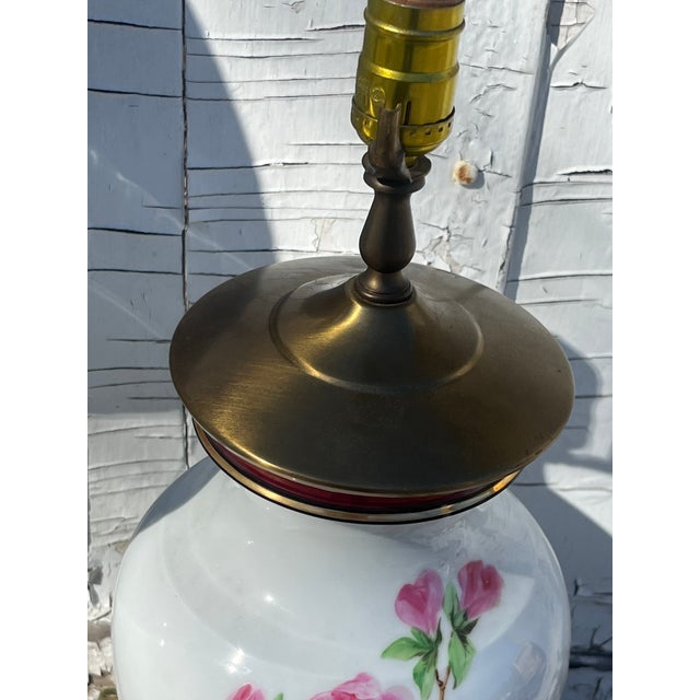 Charming and rather large scale hand painted milk glass lamps with well conceived and rendered decoration. Great color set...