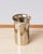 Philippe Barbier chrome-plated brass photophore candleholder or petite vase, with clear glass insert. Two oval openings...