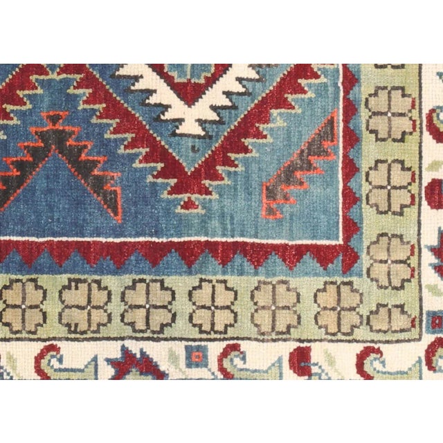 1960s Turkish Oushak Rug. Handwoven with wool on wool foundation in the Oushak region of Western Turkey. The Anatolian...