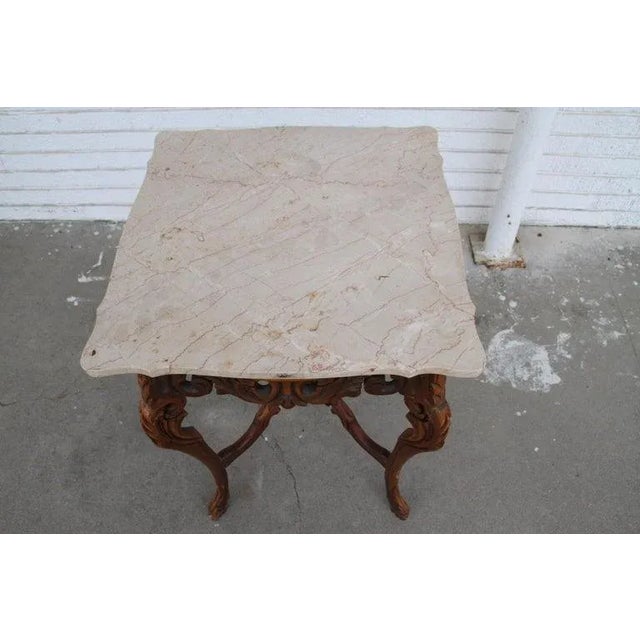 Rococco Style marble entry or side table Made by European based W & Z Furniture, this hand-carved side table features a...