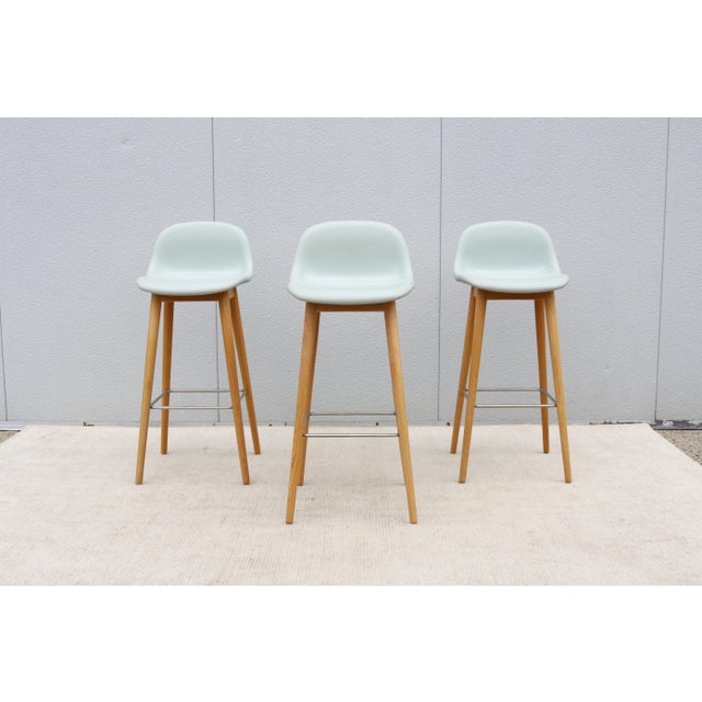 Fabulous set of 3 Fiber bar stools by Copenhagen-based design duo Iskos-Berlin for the Danish brand Muuto. These elegant...