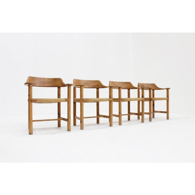 Vintage extendable dining table and dining room chairs set in pine wood from the 1970s. Large vintage extendable dining...