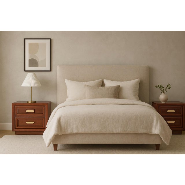 A refined pair of postmodern nightstands attributed to Burlington, featuring strong architectural lines and a warm,...