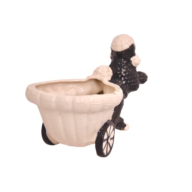 Vintage ceramic cachepot bowl flower planter pot designed as a whimsical French poodle dog pulling a cart hand painted in...