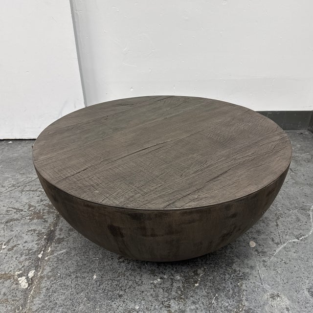 Design Plus Gallery presents a Sphere Coffee Table from Restoration Hardware. The table has a rounded drum form with a...