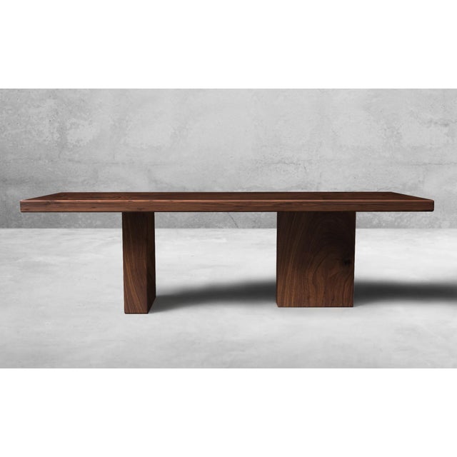 Handcrafted Luxury Elevate your dining experience with this hand built Walnut Dining Table featuring our abstract base, a...