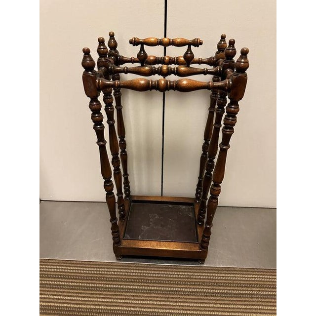 Adorable knotted wood vintage style umbrella stands. Made in Vietnam of excellent quality wood and tin plate.