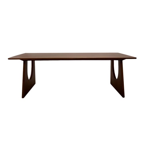 Our solid beech wood dining table, featuring exquisitely crafted semi-sphere carved legs. This unique design merges...
