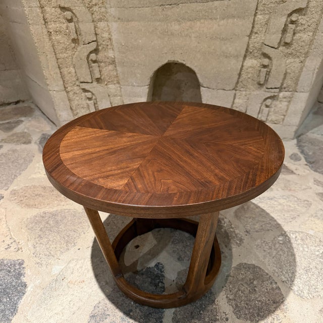 For your consideration, a vintage Lane Rhythm Walnut round drum side table, Style 997, circa 1963, featuring a distinctive...