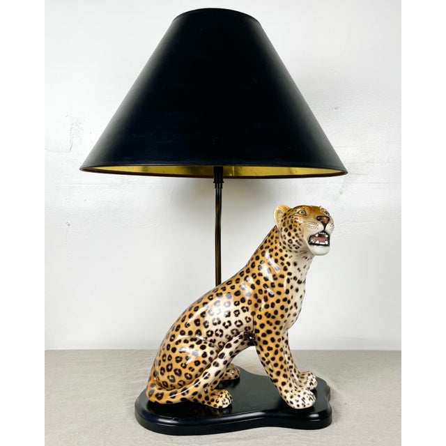 Vintage mid century ceramic leopard lamp. Elegant seated leopard/cheetah mounted on wooden base. Beautifully detailed...