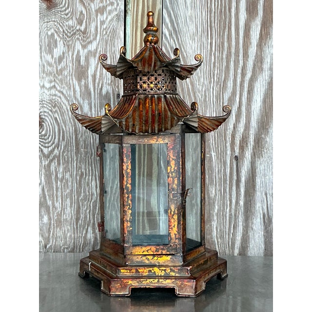 Bring a touch of Eastern elegance to your space with this vintage Asian patinated pagoda lantern. The intricate design and...