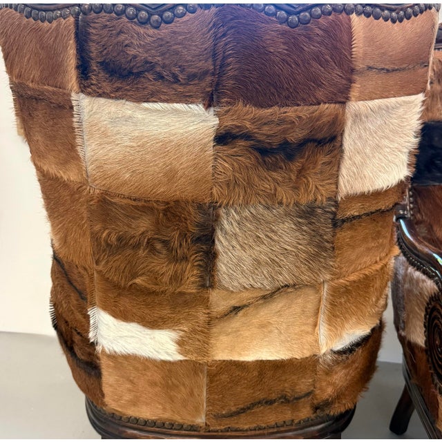 Wood Vintage Carved Wood Patchwork Cowhide Wingback Chairs - Pair For Sale - Image 7 of 9