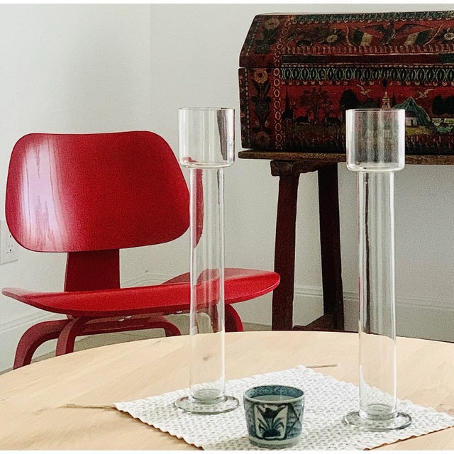 A pair of vintage mid-century English hand-blown art glass vessels with foot rims and a beautiful luminosity to the glass....