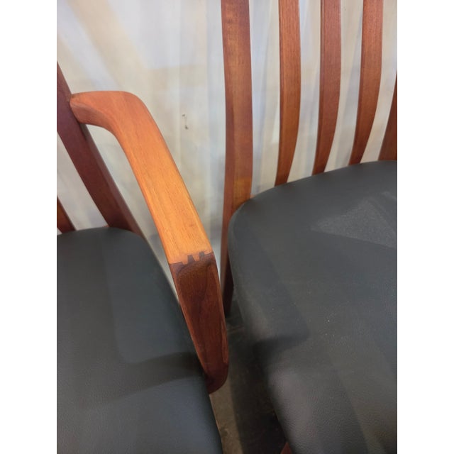 A wonderful set of 8 . There are two (2) armchairs and 6 regular for a total set of 8.