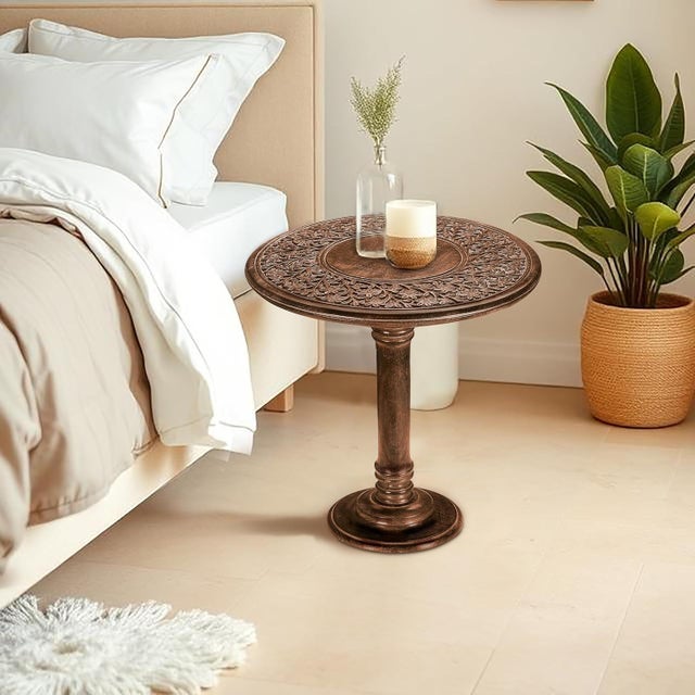 Crafted from solid mango wood, this round pedestal end table showcases timeless character with a warm burnt finish and...