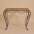A French wrought iron console table in the manner of André Dubreuil from the latter part of the 20th Century. The rich,...