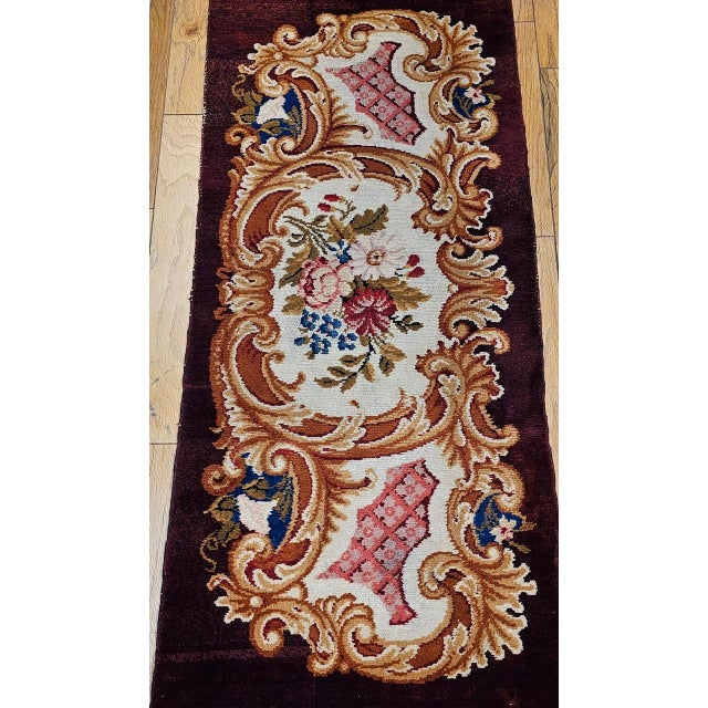 An exceptional antique French Savonnerie hand-knotted area rug from the late 19th century, crafted in the royal weaving...