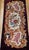 An exceptional antique French Savonnerie hand-knotted area rug from the late 19th century, crafted in the royal weaving...