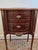 Antique French Louis XI style bedside night table or commode featuring a serpentine front and two drawers. Beautifully...