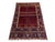 This wool rug features a bold Turkmen Parda design in deep red and navy. Two patterned central panels are framed by bands...