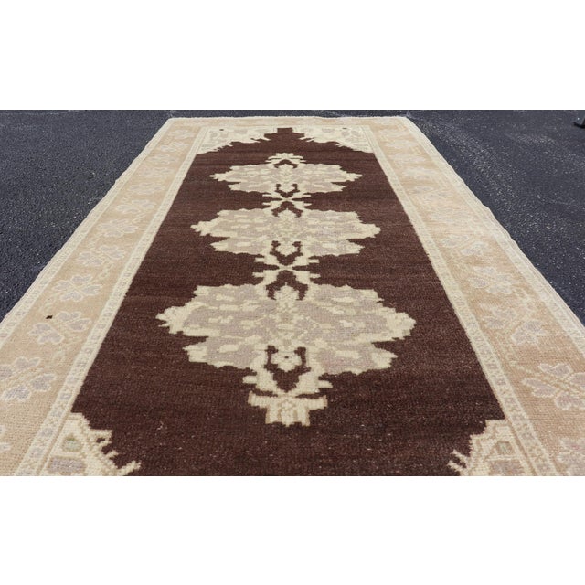 Chocolate Brown Background Vintage Turkish Oushak Runner With Medallions in Cream & Ivory For Sale - Image 8 of 12
