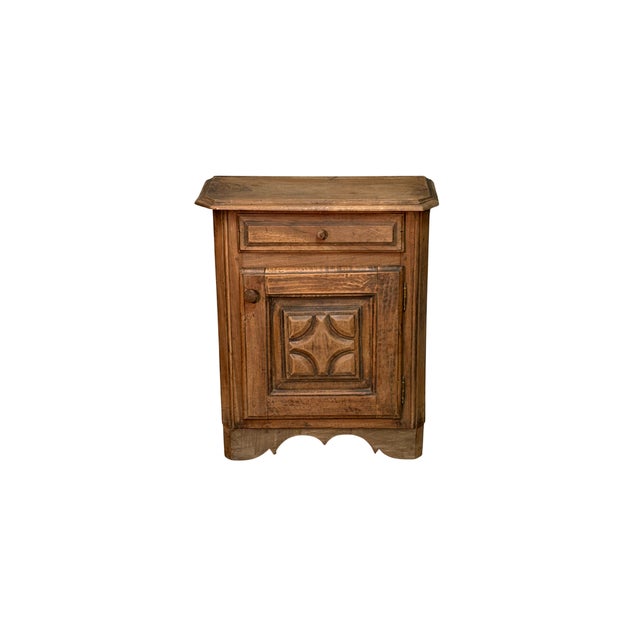Antique cabinet made from an 18th-century walnut kneeler, featuring a diamond-shaped door and upper drawer. The harmonious...