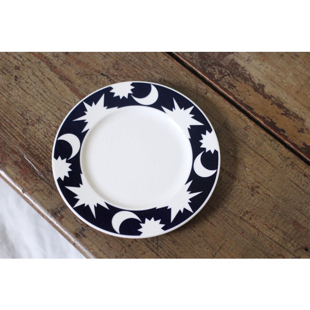A set of large salad plates made by Pagnossin Ironstone. Cobalt blue rims with star, sun and moon pattern. Beautiful...