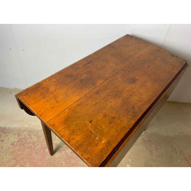 A nice early New England Hepplewhite Cherry Pembroke table 1790-1810. Nicely straight tapered legs and “cookie cutter...